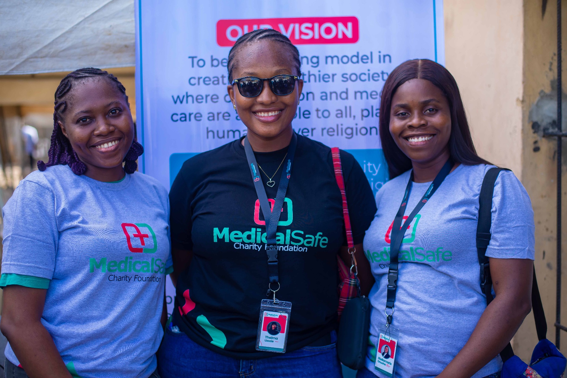 MSCF volunteers in front of the Our Vision banner