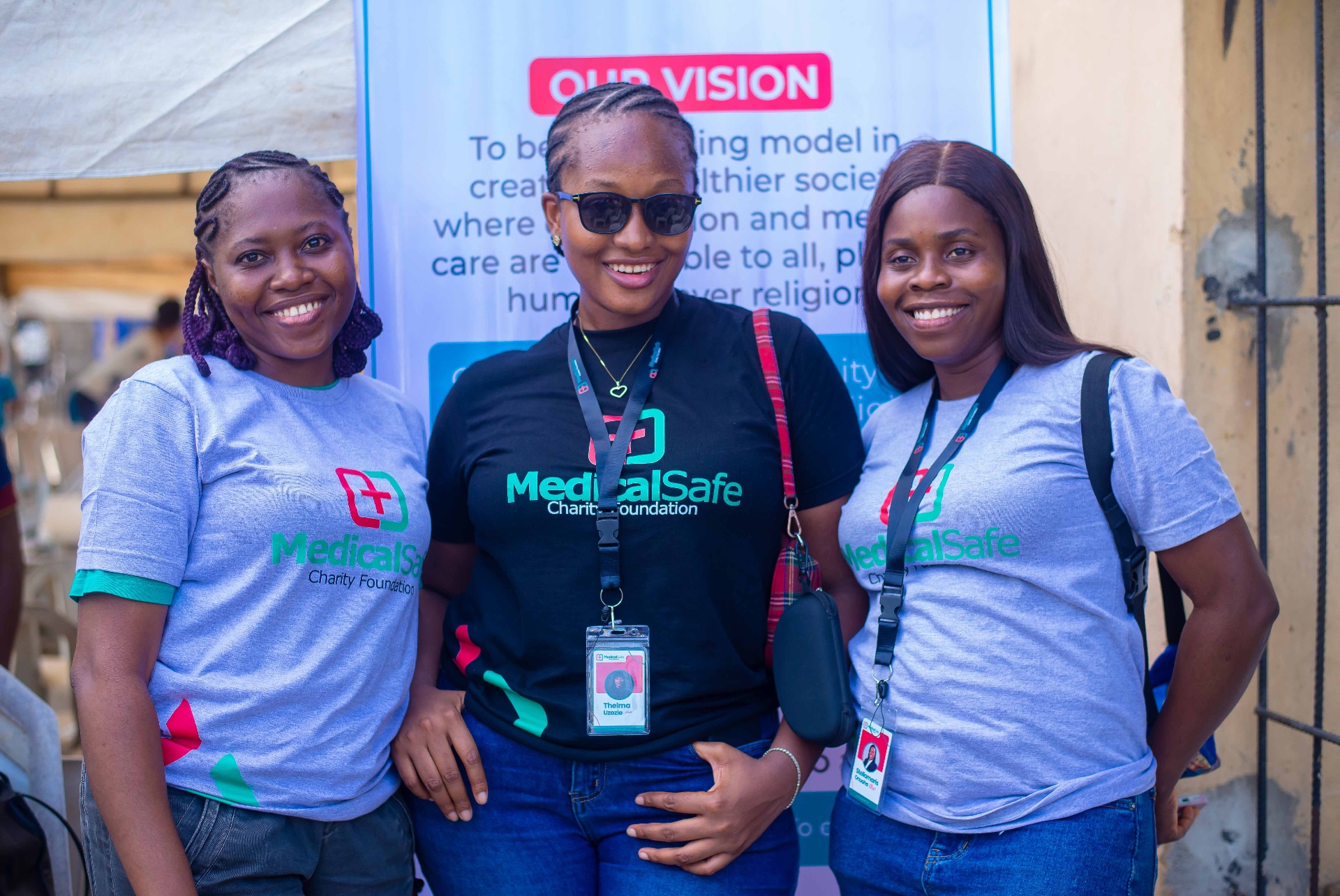 MSCF volunteers posing at vision banner